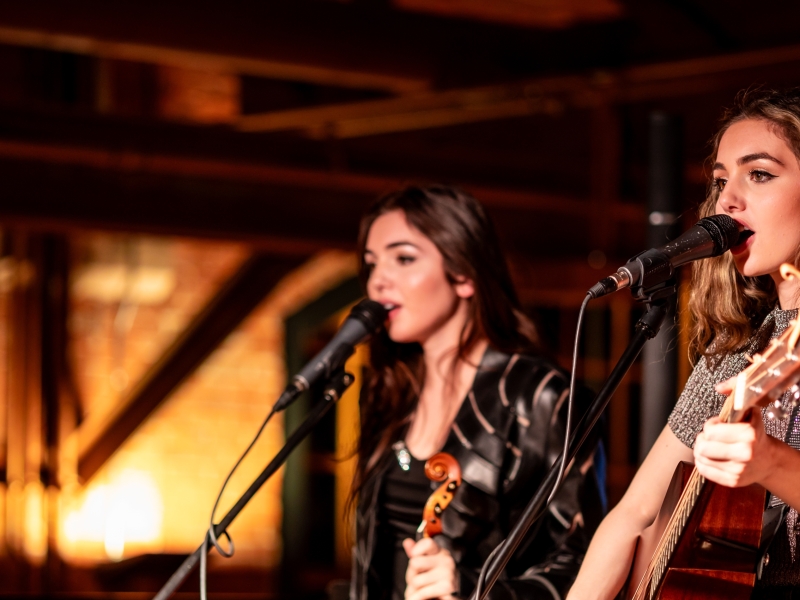 Ava and Lily Rashed perfom live music at Founders' Food Hall & Market